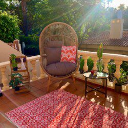 spacious terrace with comfortable furniture and views over the Atlantic Ocean.